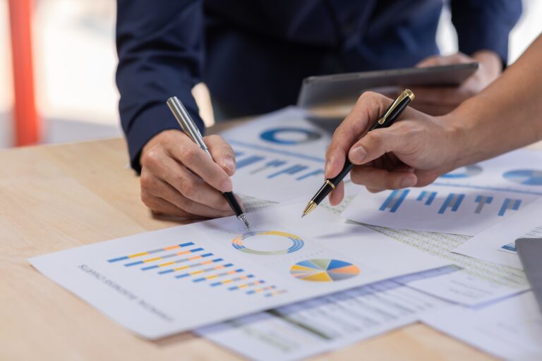 Marketing Financial analyst analysis business financial report on digital tablet during discussion a